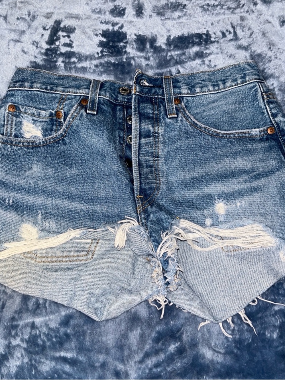 Levi's Distressed Light Blue Denim Cutoff Jean Shorts